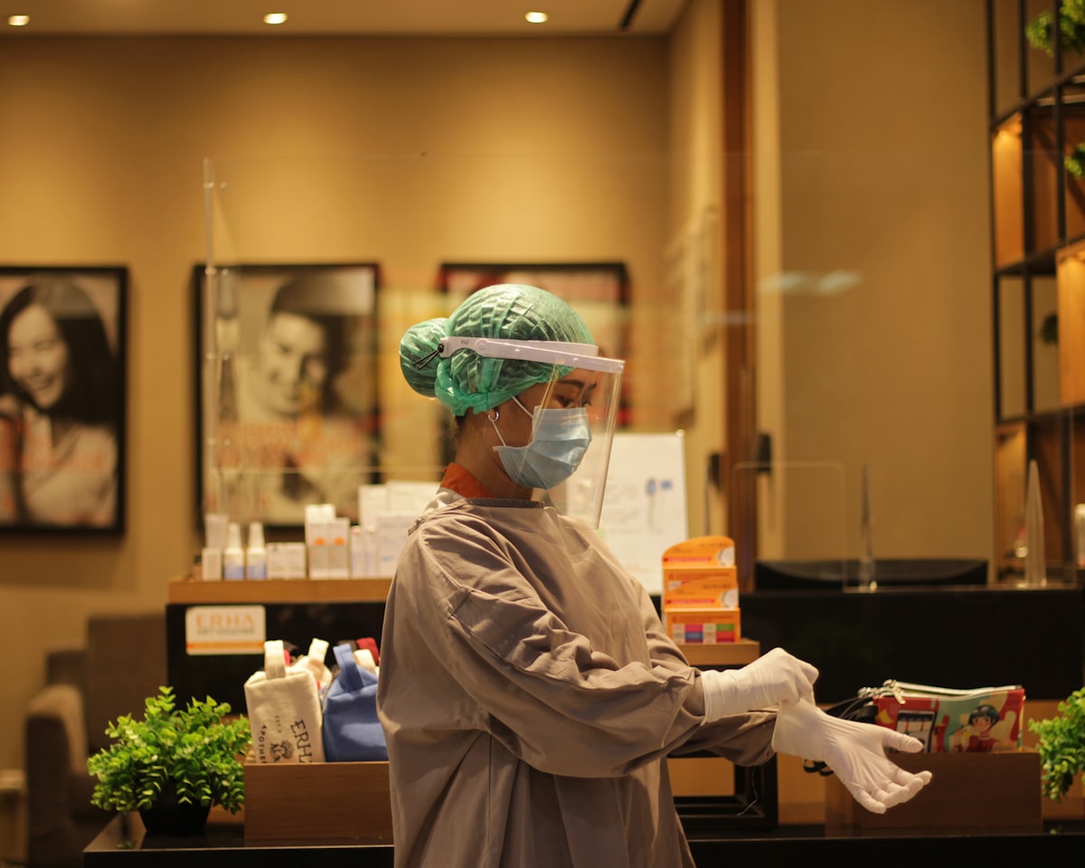 Podiatrist examining a patient foot for plantar fasciitis in a Sydney clinic