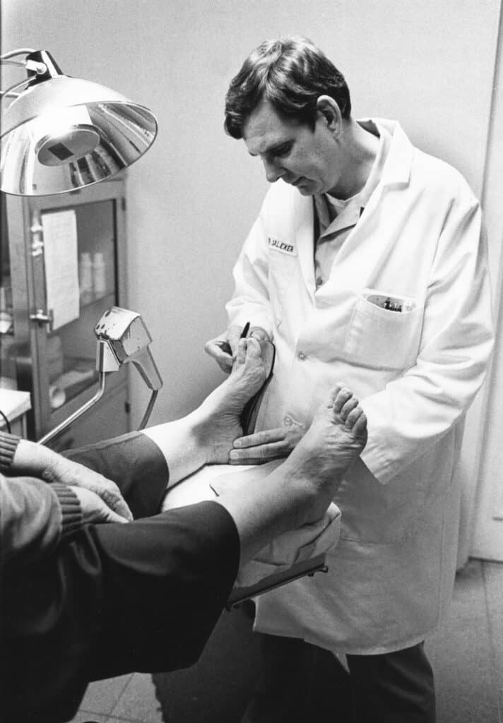 Podiatrist examining a patient's foot and ankle during Morton's neuroma assessment in Sydney