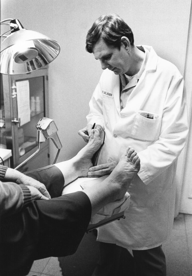 Podiatrist examining a patient's foot and ankle during Morton's neuroma assessment in Sydney